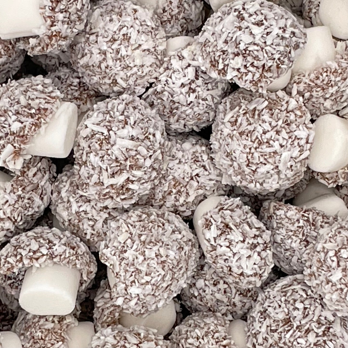 Taveners Coconut Mushrooms - Mushroom shaped chewy sweets coated in coconut flakes.