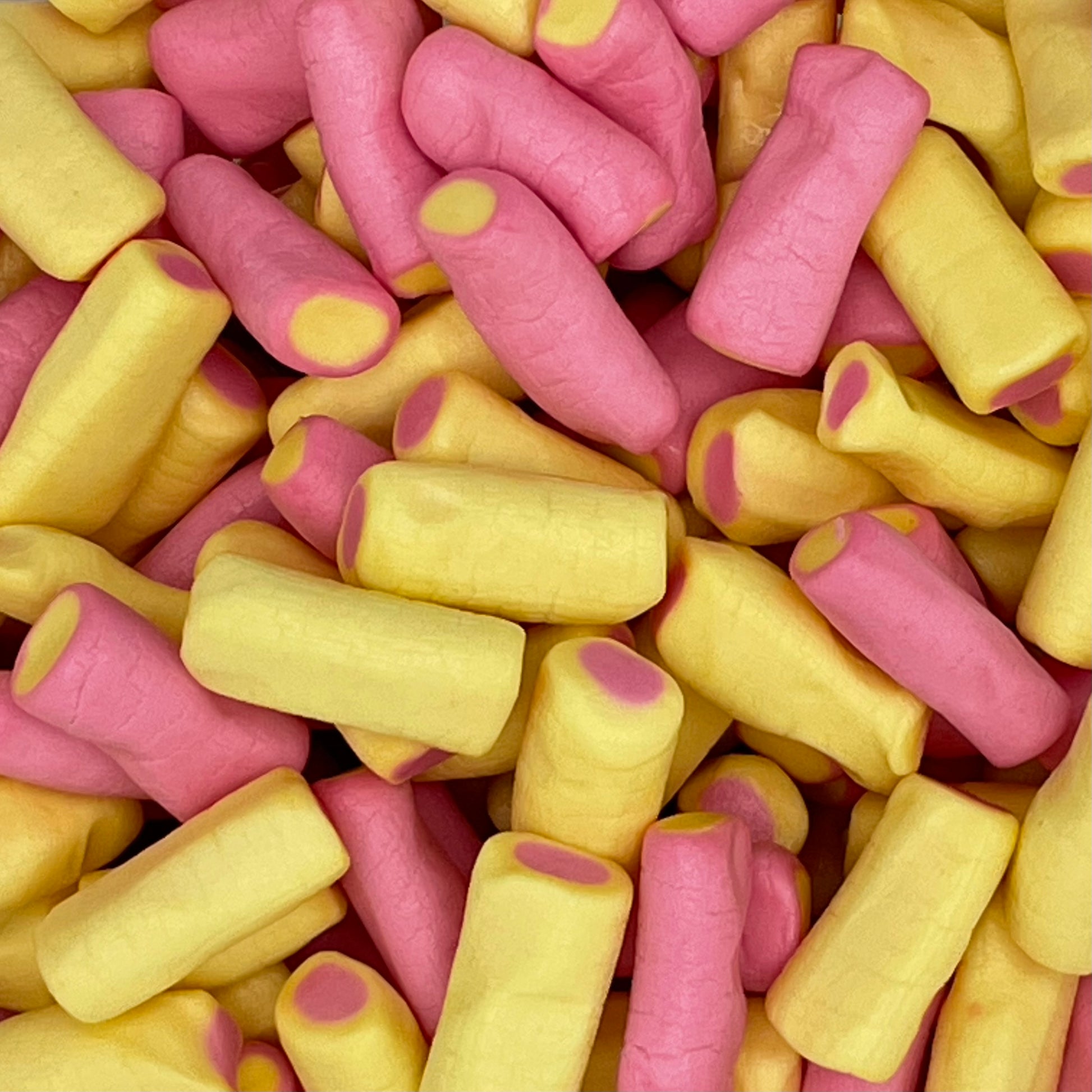 Haribo Rhubarb & Custard - Rhubarb and custard flavoured sweets in a mini pencil shape.