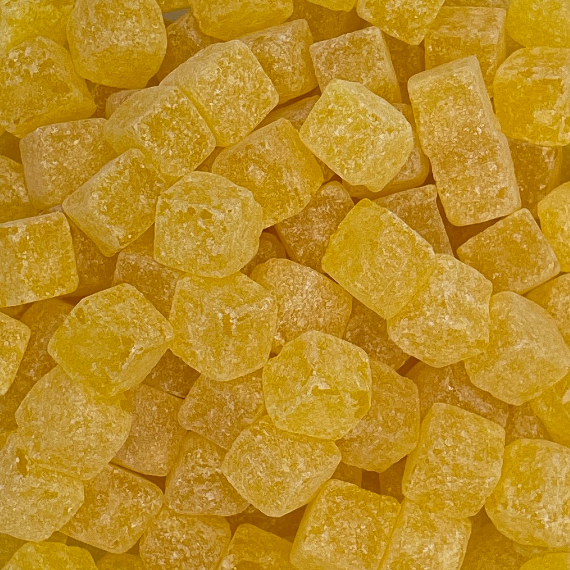 Royale Pineapple Cubes - Crystallised pineapple flavoured cube shaped boiled sweets with a chewy centre.