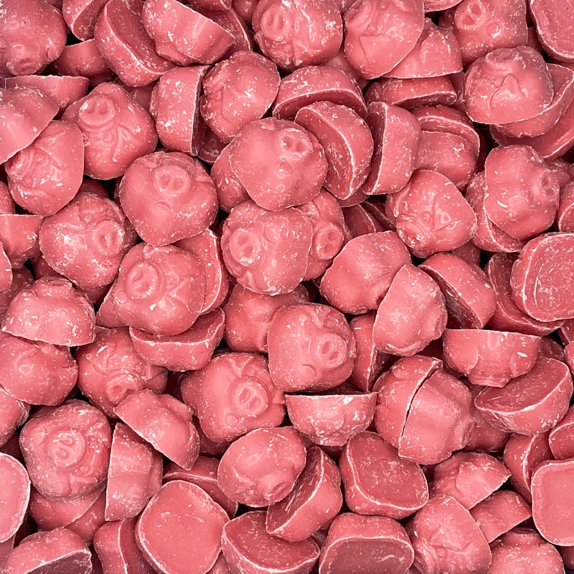 Pink Pigs. Strawbeery flavour candy pieces in the shape of a Pigs face.