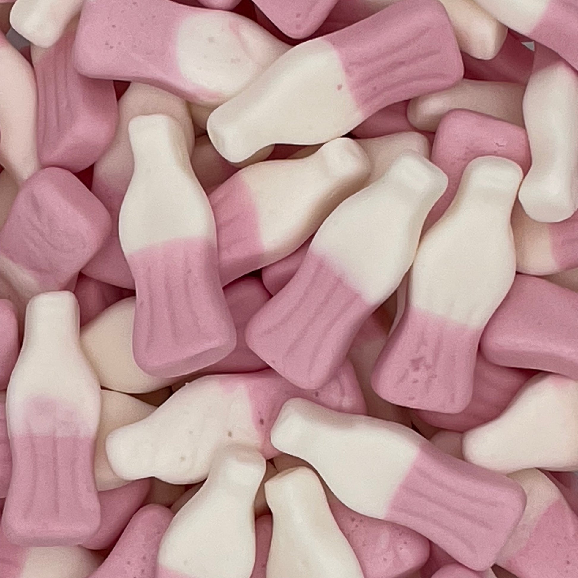 Strawberry Milkshake Bottles - Strawberry flavour jelly foam sweets.